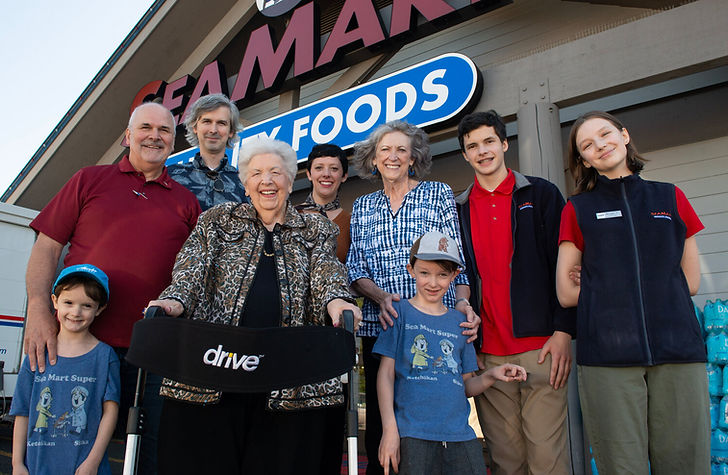 Four generations of the Hames family celebrate the 75th anniversary of the Hames Corporation August 2024. The family members are, front from left, Clark, Barbara and Henry; and back from left, Roger, Brian, Jessica, Mary, Justin and Morgan Hames. The Hames family is selling their stores to Albertson’s/Safeway. (James Poulson / Daily Sitka Sentinel)